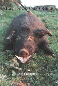 Two Dogs and a Rifle by Ken Cuthbertson